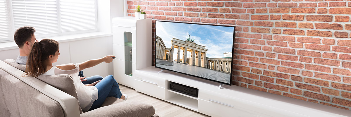 Couple watching television in a buy-to-let home